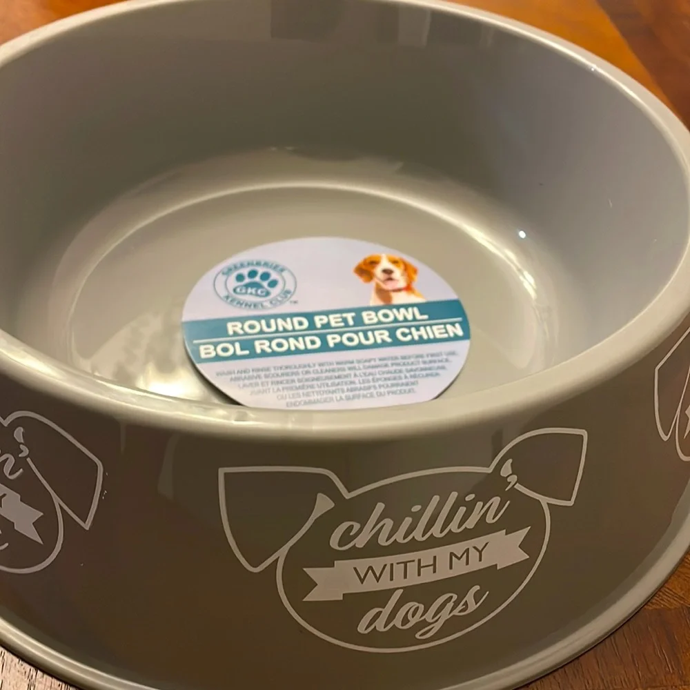 New two large dog bowls, one pet food jar, one small pet food jar